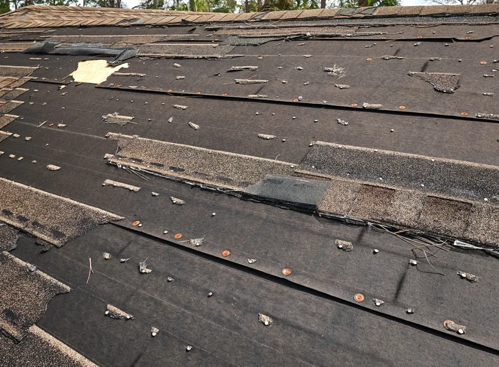 wind damaged roof needing an emergency storm damage restoration contractor central il